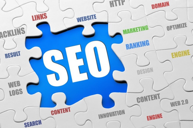 Jigsaw puzzle with SEO related words on different pieces and a big blue piece saying SEO
