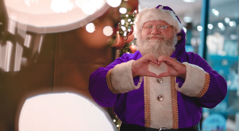 Purple Santa at Christmas for Indulge Media Christmas campaign