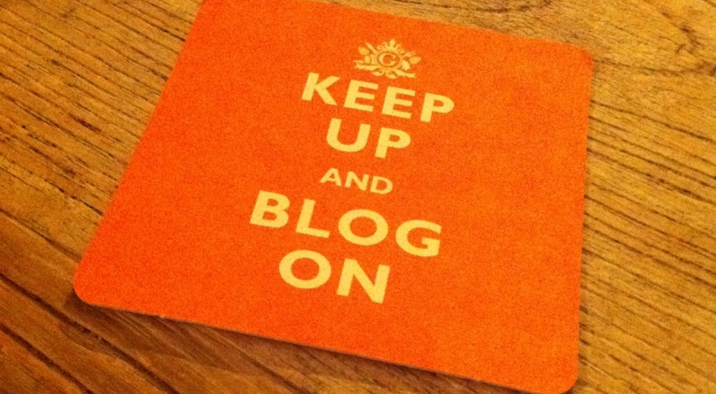 Coaster with text saying 'Keep up and blog on'