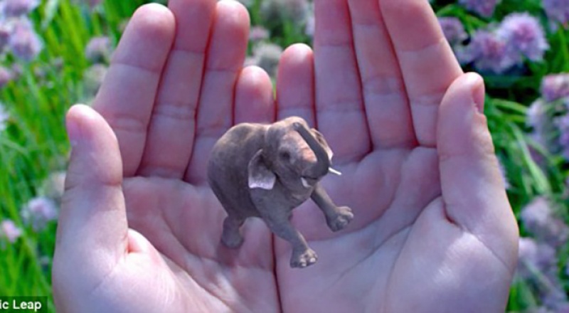 Computer generated elephant held in human hands